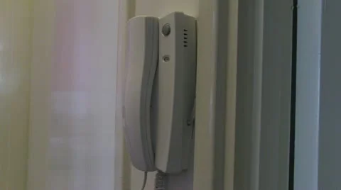 Entry phone lift and replace handset Stock Footage 22339545