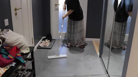 Entryway Floor Cleaning Beside Mirrored Closet Stock Footage 335589855