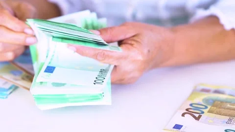Enumerating the 100 Euro Banknotes Stock Footage 144611293