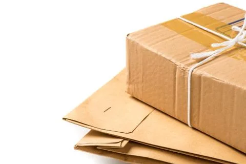 Envelope and parcel over white Foto stock