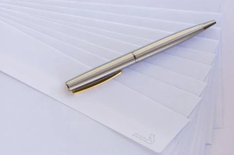 Envelope and pen Stock Photos