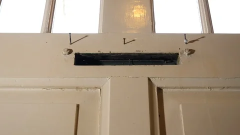 Envelope arrives in mailbox. Stock Footage 87500576