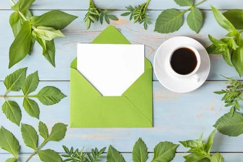 Envelope with black coffee Stock Photos