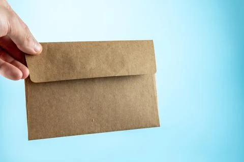 Envelope on blue background copy space Stock Photos