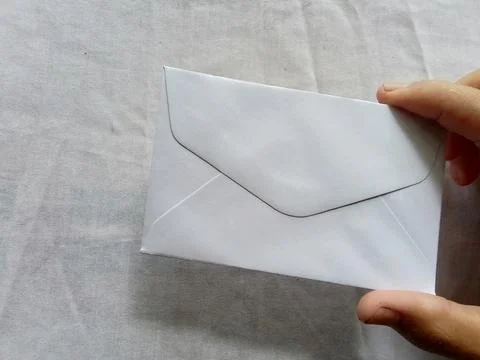 An envelope with a cloth background. Foto stock