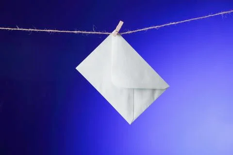 Envelope on clothes line Stock Photos