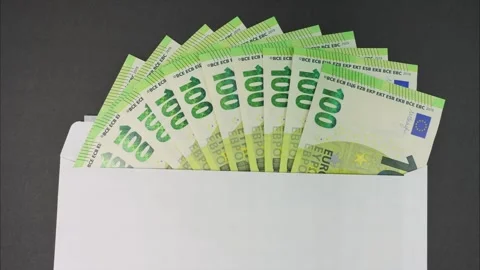 Envelope with euros next to a flying plane. Savings for trip. Stop motion Video stock 293244997