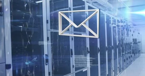 Envelope icon above server racks represents email storage Stock Photos