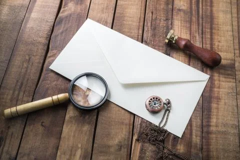 Envelope, magnifier, stamp, clock Stock Photos