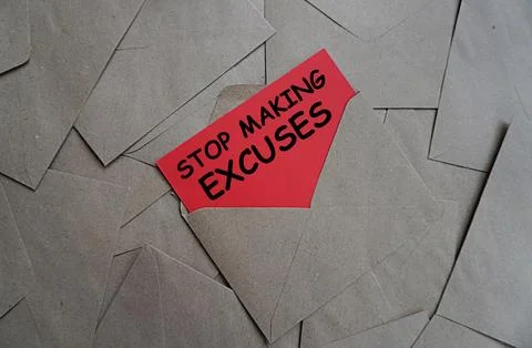 Envelope with a note written stop making excuses, self-development concept 스톡 사진