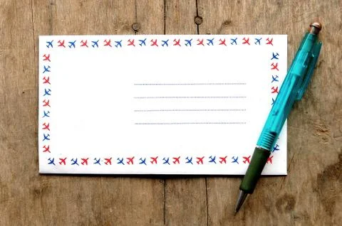 Envelope with pen 스톡 사진