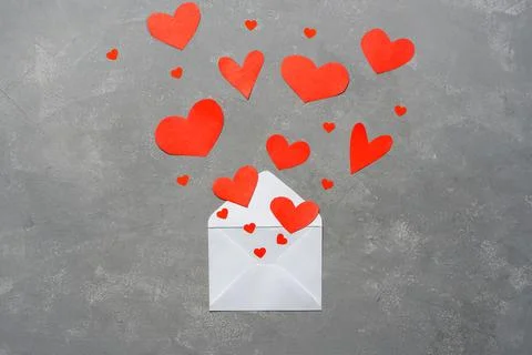 Envelope with red hearts Stock Photos