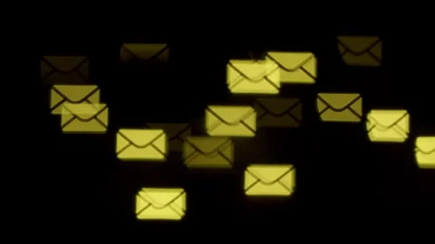 Envelope-shaped bokeh on black background Stock Footage 302080857
