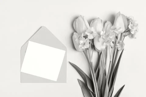Envelope with spring flowers in colors cloud dancer Stock Photos