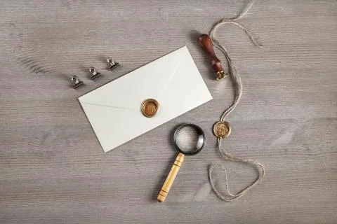 Envelope, stamp, magnifier Stock Photos
