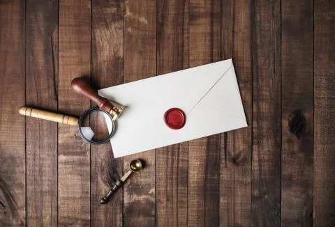 Envelope, stamp, magnifier Stock Photos