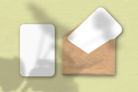 An envelope with two sheets of textured white paper on a yellow table backgro Stock Illustration