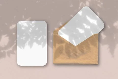 An envelope with two sheets of textured white paper on a blue table backgroun Stock Illustration