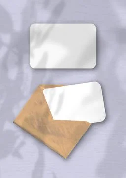 An envelope with two sheets of textured white paper on the purple background. Stock-Illustration