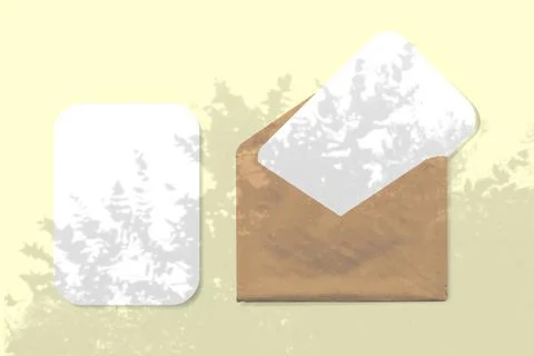 An envelope with two sheets of textured white paper on yellow background. Mock Stock Illustration