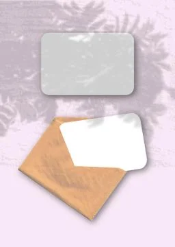 An envelope with two sheets of textured white paper on the pink background of Stock Photos