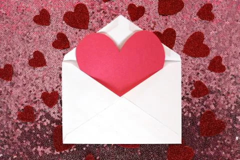 Envelope with Valentine's Day Heart Note and Confetti on Pink Sequin Backgrou Stock Photos