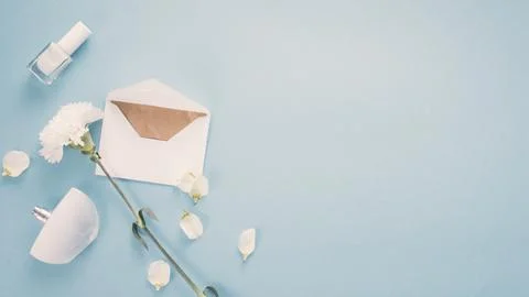 Envelope with white flower perfume table Stock Photos
