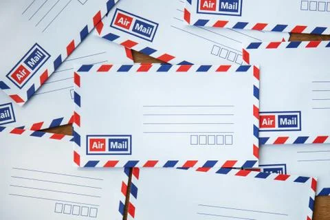 Envelope on wooden background Stock Photos