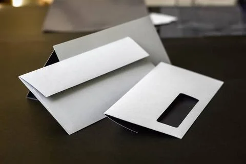 Envelopes with window Modern envelopes with a window. Shallow depth of fie... Stock Photos
