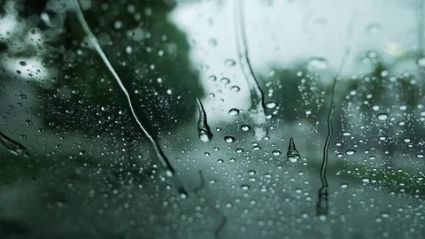 Environment and Ecology Concept. Rain Drop on Glass Window. Rainy Day on the Stock Footage 114306993