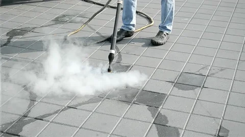 Environment cleaning with hot steam technology. worker with special device. Video stock 46454427