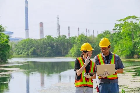 Environment engineer team working survey, inspector industry impact of wate.. Foto stock