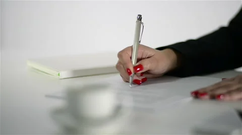 Environment of a modern and good looking office. Woman signing an agreement. Stock Footage 62652561
