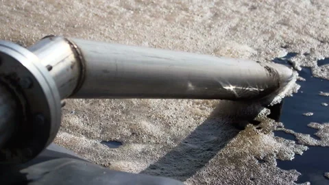 Environment protection concept. Industrial pipe discharging dirty waste Stock Footage 87345049