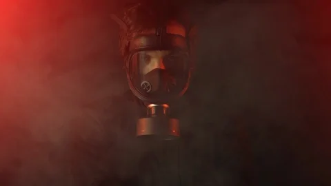 Environmental disaster. Post apocalyptic survivor in gas mask among poison smoke Stock Footage 123871603