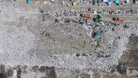 Environmental effect people poor trash truck dirty waste Stock Footage 159118292