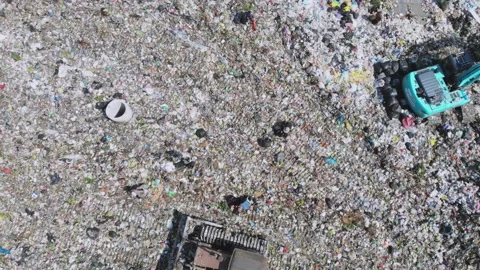 Environmental effect people poor trash truck dirty waste Stock Footage 159118293