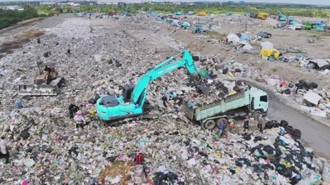 Environmental effect people poor trash truck dirty waste Stock Footage 159118295