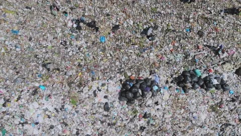Environmental effect people poor trash truck dirty waste Stock Footage 159118299
