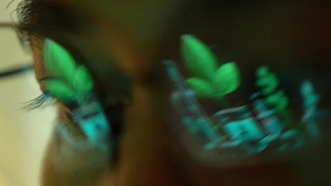An environmental engineer examines a digital sustainability interface. Stock-Footage 341663305