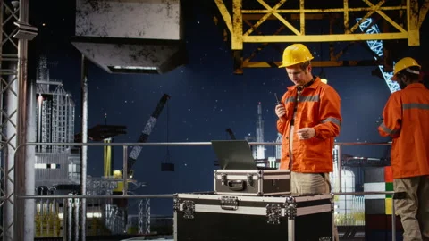 Environmental engineer uses radio communication to inspect offshore platform Stock Footage 324704584