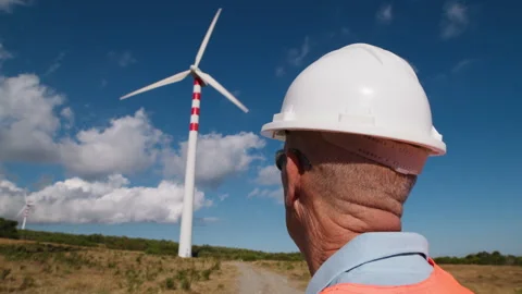 Environmental Engineer Watching The Functioning Of A Wind Turbine Video stock 270210689