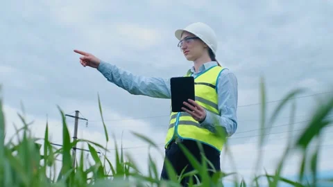 Environmental engineer woman uses project documents and files and collects effec 스톡 동영상 241801688