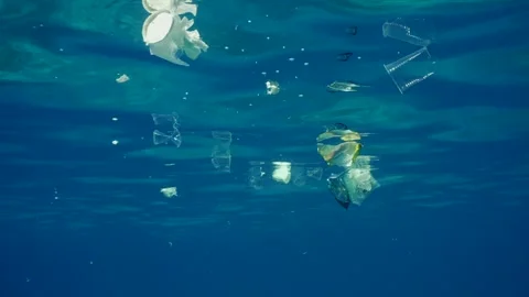 Environmental Issue underwater plastic pollution in Ocean, Slow motion. Video stock 241214818