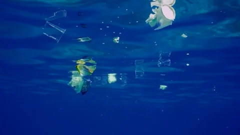 Environmental Issue underwater plastic pollution in Ocean, Slow motion. Stock Footage 249870896