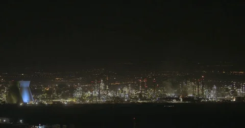 Environmental pollution - large oil refinery at night Stock Footage 74267404