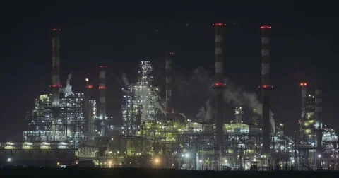 Environmental pollution - large scale oil refinery at nighttime Stock Footage 74267607