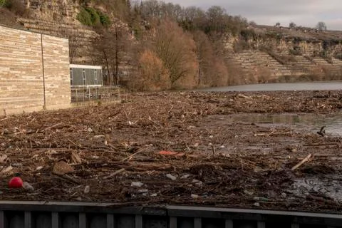 Environmental pollution at a lock on the Neckar river a lot of wood and plast Stock Photos