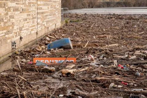 Environmental pollution at a lock on the Neckar river a lot of wood and plast Stock Photos
