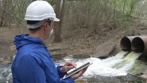 Environmental pollution radiation waste concept . man chemist scientist in a Stock Footage 130085648